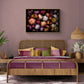 Landscape format dark botanical print of multi-coloured heritage Chrysanthemums photographed on a black background hung over a double sized bed