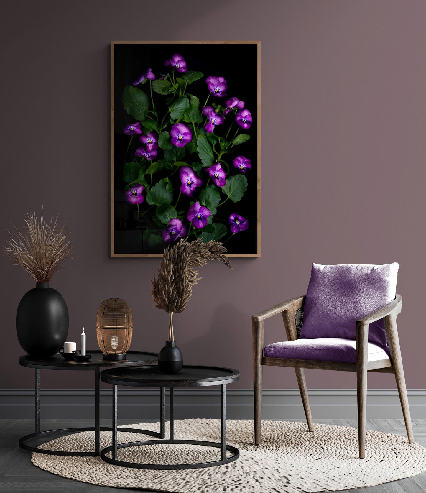 Large botanical print of Purple Violsa with green foliage framed and hng on a pale mauve wall. 