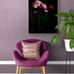 Botanical print of pink double Tulips with mixed colour Ranunculus on a black background, framed on a pink wall