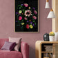 A botanical print featuring a Sunflower with Zinnias, Dahlias, Verbena and a touch of the Shoo Fly plant, Nicandra physalodes., framed on a peach coloured  wall.